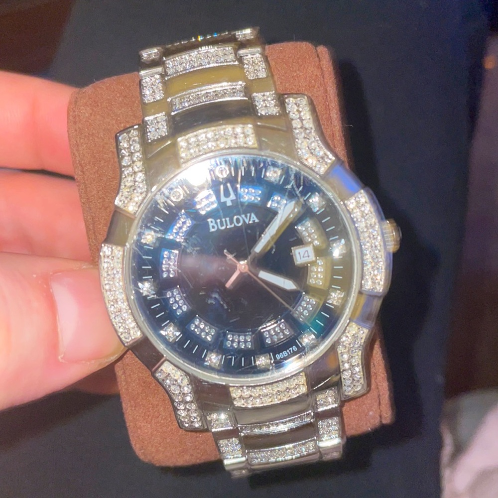 Men’s silver Bulova with crystal bezel and band